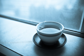 Window and coffee cup