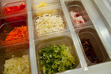 sliced vegetables and meat  to Japanese cuisine