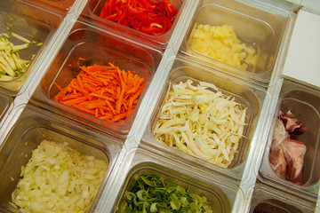 sliced vegetables and meat  to Japanese cuisine