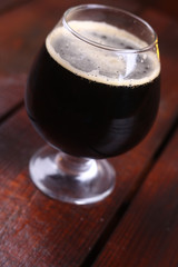 Glass of dark stout