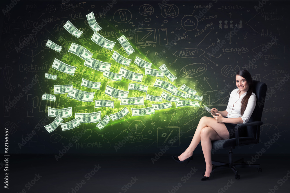 Poster Businesswoman sitting in chair holding tablet with dollar bills