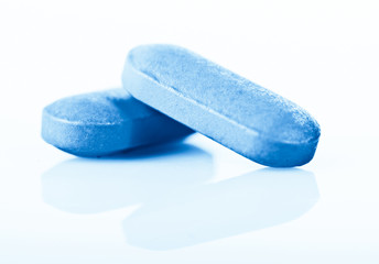 Group of pink medical pills isolated