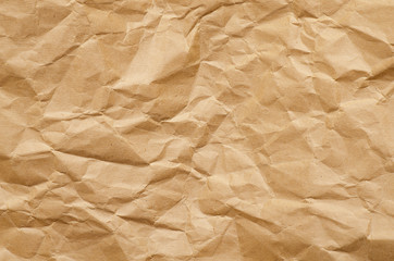 Crumbled brown paper background