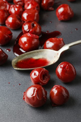 Cherries on grey background