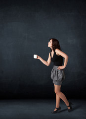 Businesswoman holding a white cup