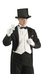 magician holding playing cards