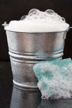 Bucket Of Soap Suds And Sponge