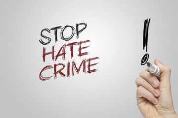 Hand writing stop hate crime