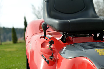 Close-up detail of garden tractor with leather seat