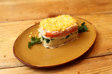 Salmon salad on the plate