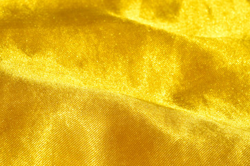 Close-up detail of gold satin
