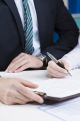 Female hands filling the form