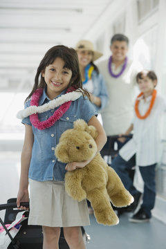Hispanic family traveling in airport