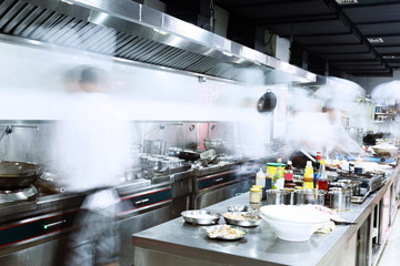 modern kitchen and busy chefs
