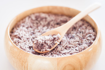 Berry rice in wooden bowl