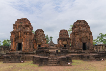 Fototapeta na wymiar The group of brick towers of Mueang Tam Stone Castle