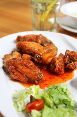 Bbq chicken wings with dips and salad