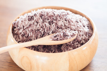 Berry rice in wooden bowl