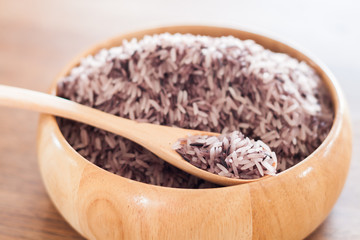 Berry rice in wooden bowl