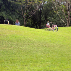 Teenagers sit at the park