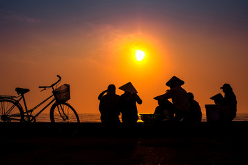 life of fishermen in sunrise on the beach, vietnam