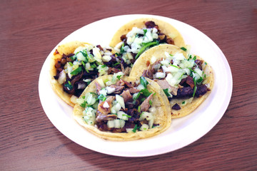 Carne Asada and Carnitas Taco Plate