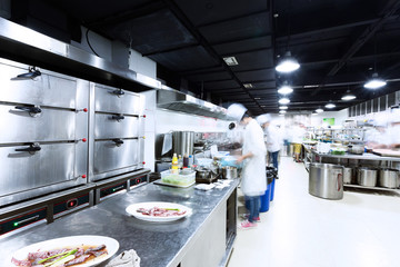 modern kitchen and busy chefs