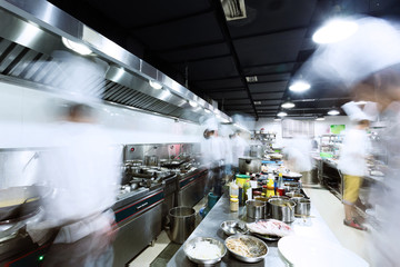 modern kitchen and busy chefs - 82189542