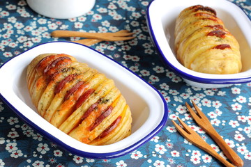 Hasselback potatoes with chorizo sausage and cheese