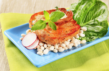 Spicy pork chop with white beans