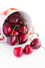 Fresh cherries in a cup