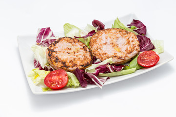 Chicken burger over salad
