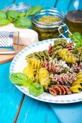 Italian pasta with pesto and fresh basil
