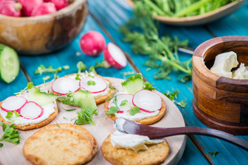 Healthy snacks,crackers with cottage cheese and fresh vegetables