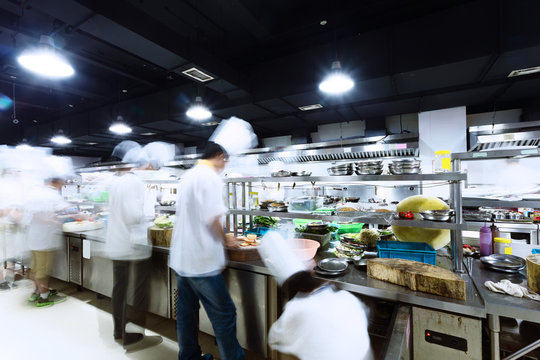 modern kitchen and busy chefs