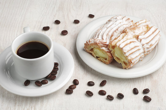 Cake with creamy and coffee cup