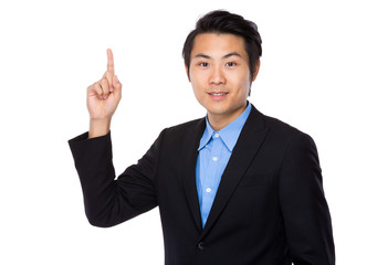 Businessman with finger point upwards