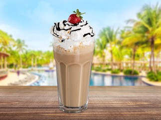 Iced. Frappuccino with ice in take away cup on white background