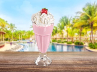 Pink. Milkshake with strawberry and cream isolated