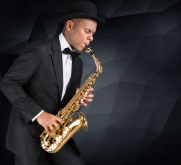 Obraz na płótnie Canvas Sax. Black american jazz saxophone player. Vintage. Studio shot.
