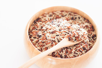 Organic Dry Multi Grain Rice in wooden bowl