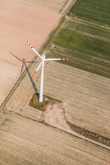 aerial view of wind turbine on a field