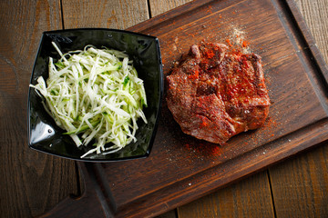 Delicious steak with red chili pepper