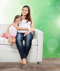 Obraz premium Pregnant. Young Happy Pregnant woman and son