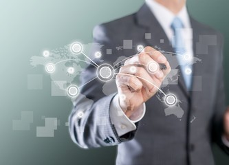 Apartment. Businessman hand drawing house in a whiteboard