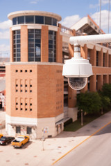 Video Security Camera Housings Mounted High on College Campus