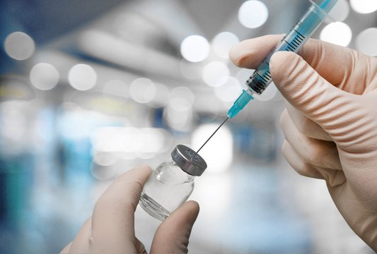 Vaccination. Syringe & vial