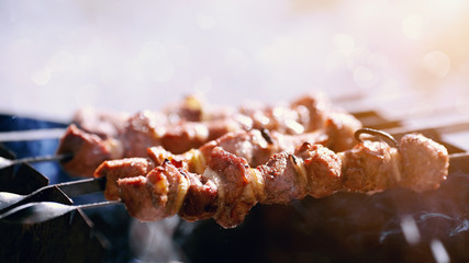 Grilling marinated shashlik