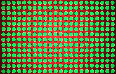 The optical illusion of movement executed in the form of fluctuating green circles over red background