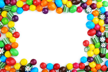 Colorful candies on white background